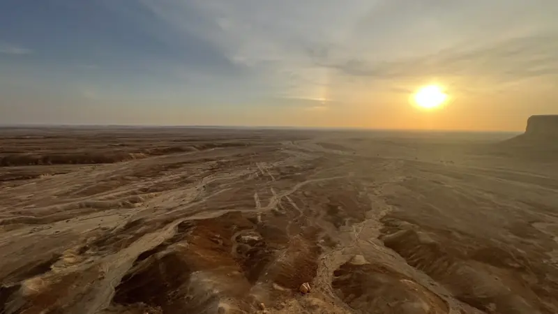Sunset over the Thadiq escarpment during a geopark field survey in the Riyadh Region, Saudi Arabia